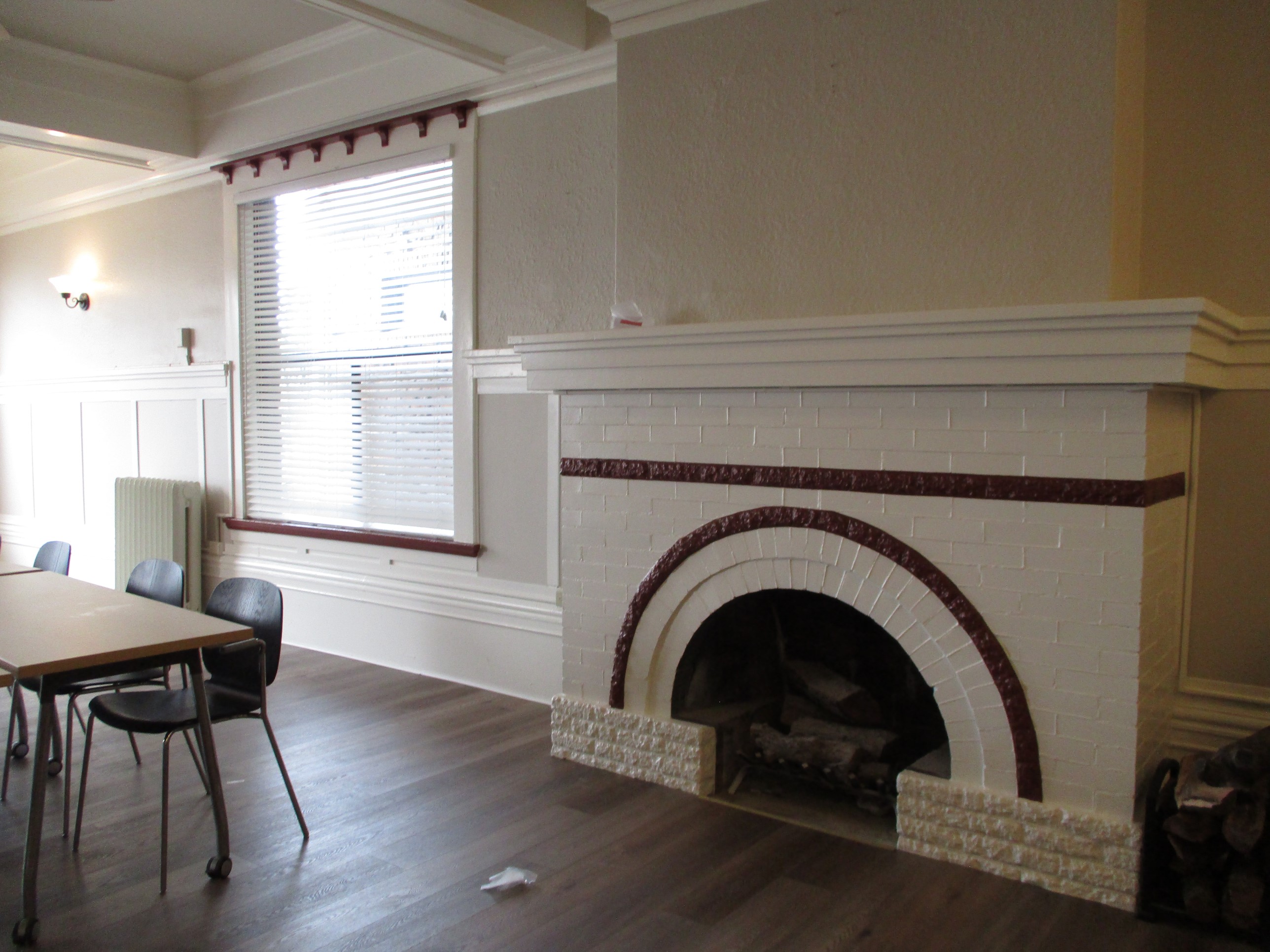 After Madison Park Apartments community room fireplace